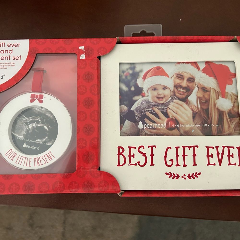 Holiday ornament and picture frame for new baby